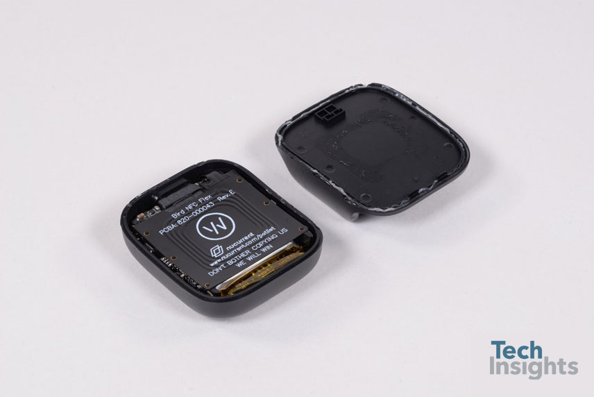 Inside the WHOOP 4.0 fitness tracker. The battery is located under the wireless charger.